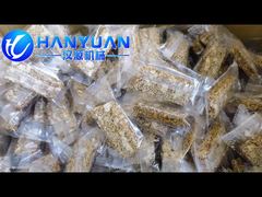 This video teaches you how to use sesame candy bar packing mahchine